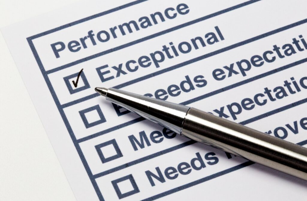 Cannabis dispensary manager conducting a performance review with a budtender